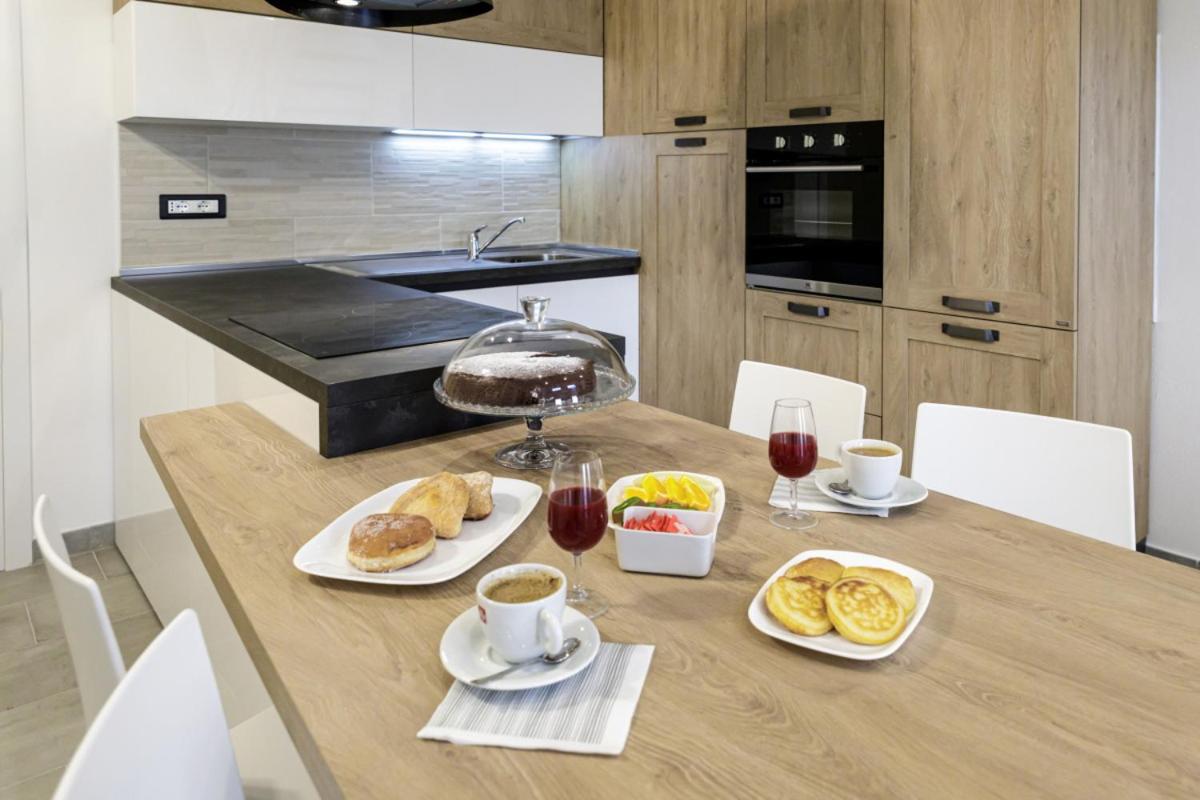 Bandiera 68 Apartment กาญารี ภายนอก รูปภาพ
